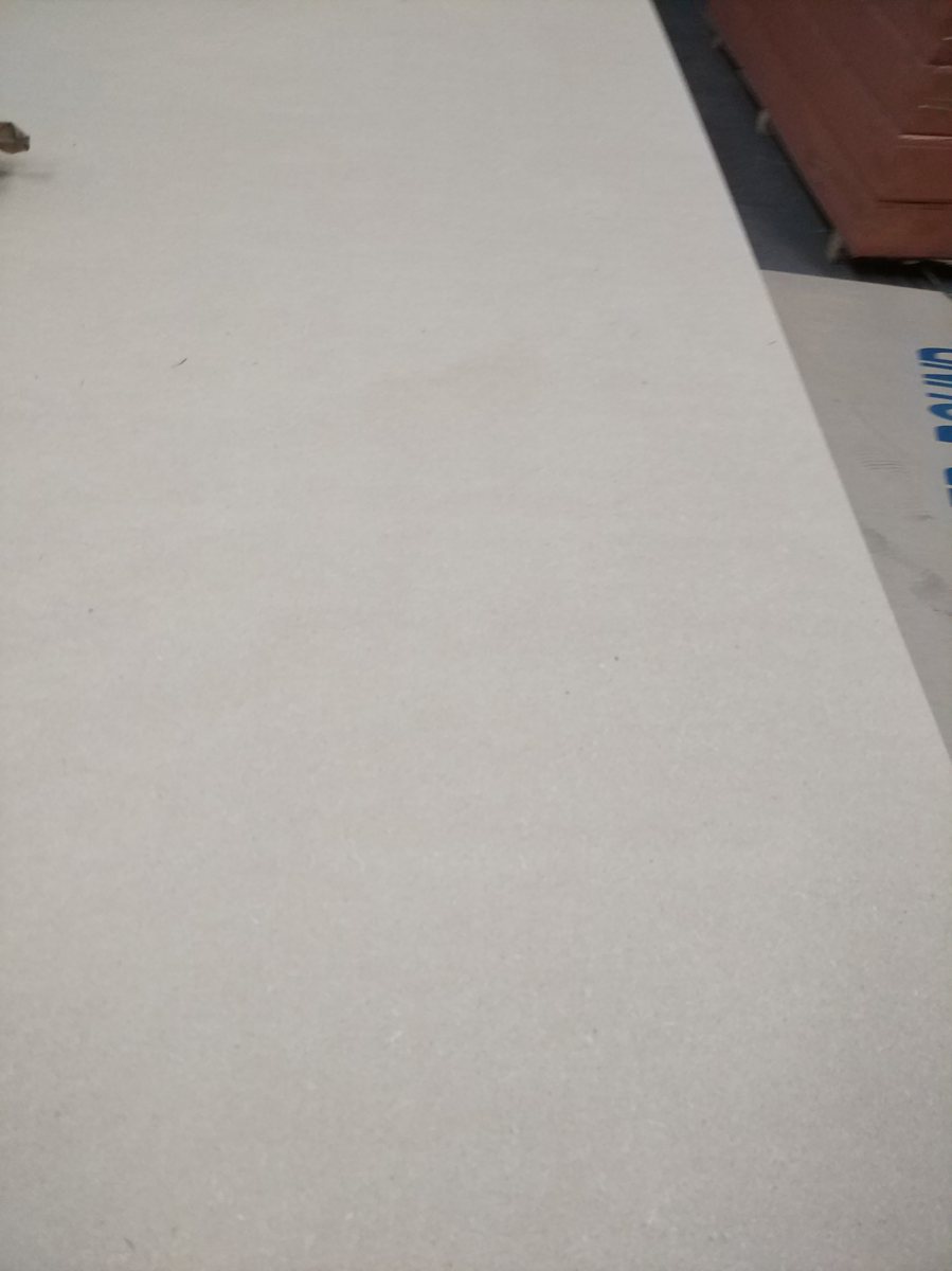 Smooth pale panel surface from a historical material reference photograph
